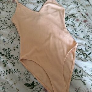 Cute apricot bodysuit, new
